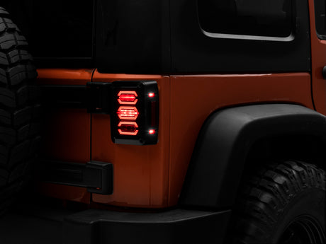 Raxiom 07-18 Jeep Wrangler JK LED Tail Lights- Black Housing (Smoked Lens) - J106751