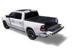 White pickup truck with open bed cover showcasing 15-6347-MXB Bedslide Ram 5.7 Rambox