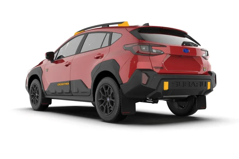 2024 Subaru Crosstrek Wilderness with Rally Armor Black UR Mudflaps featuring wild-orange logo, no-drill installation for premium protection and unique style.