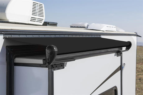 Carefree HI1920000TR Alpine 192' White/White Trim Rolled awning installed on an RV, showcasing its sleek and durable design.