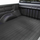 Heavy-duty 639N Trailfx Bedmat installed in a Chevrolet/GMC truck's 5.5' bed, featuring a non-slip surface for superior cargo protection, Truck & Automotive, Truck Bed Accessories, AVADA - Best Sellers.