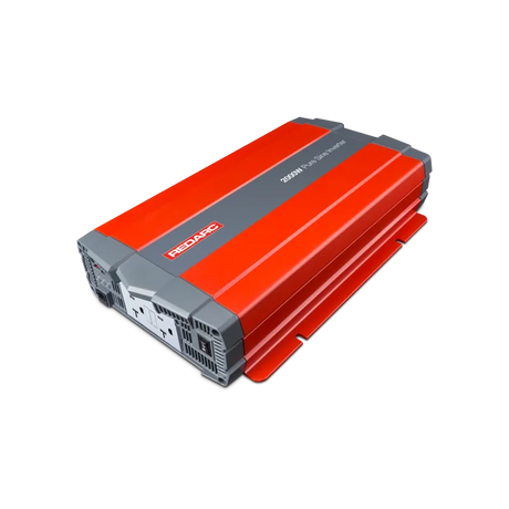 REDARC Pure Sine Wave Inverter - 2000W robust red and gray design, front power outlets, advanced compact power solution for off-grid adventures.