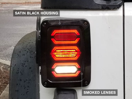 Raxiom 07-18 Jeep Wrangler JK LED Tail Lights- Black Housing (Smoked Lens) - J106751