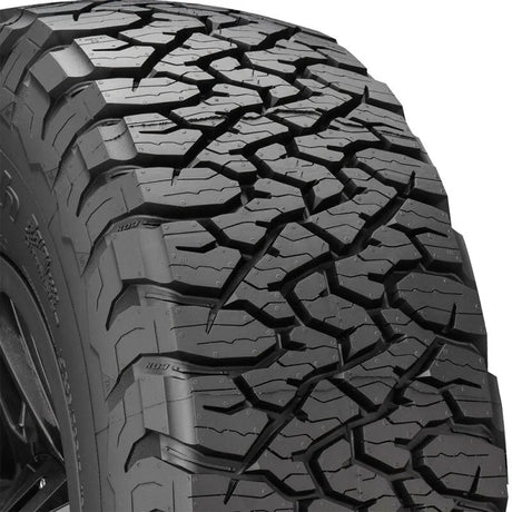 Close-up image of BFGoodrich All Terrain T/A KO3 LT285/70R18 tire, showcasing aggressive tread pattern for enhanced traction and durability.