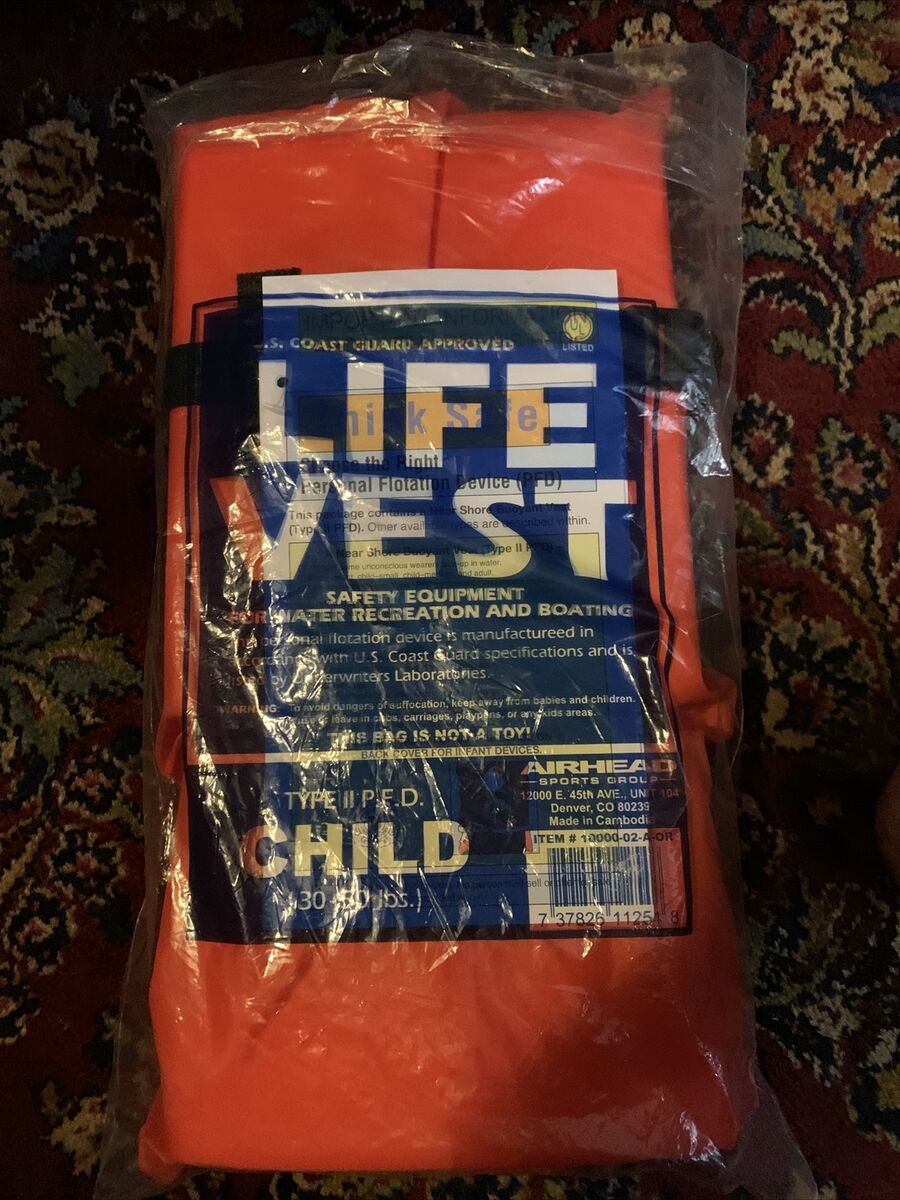 Orange Airhead Type II Keyhole Life Vest in packaging for child safety on water.