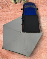 Nomadic 270 Lt Driver Awning attached to blue truck, ideal for RV, Automotive, Powersports, off-road, marine, truck bed, outdoor living, Exterior Parts & Accessories, AVADA - Best Sellers.