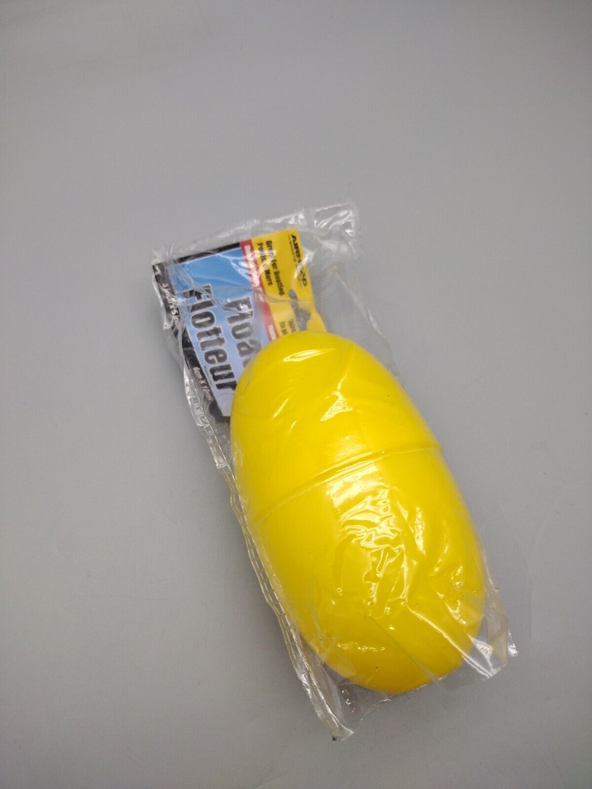 Yellow F-5Y Airhead Float, 5' X 3', sealed in packaging for ultimate relaxation and water fun.