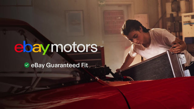 A woman working on a car engine in a garage, with "eBay Motors" and "eBay Guaranteed Fit" text overlaid.