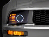 Raxiom 05-09 Ford Mustang Halogen 2010 Style LED Halo Headlights-Blk Hsng(Clear Lens/Excludes GT500)