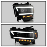 Spyder 19-22 Dodge Ram 2500 Projector Headlights Black with Sequential LED Turn Signal and Clear Light Bar Parking Light.