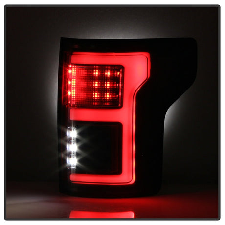 Spyder 15-18 Ford F-150 Light Bar LED Tail Lights (w/Blind Spot) - Black (ALT-YD-FF15015BS-LBLED-BK) 